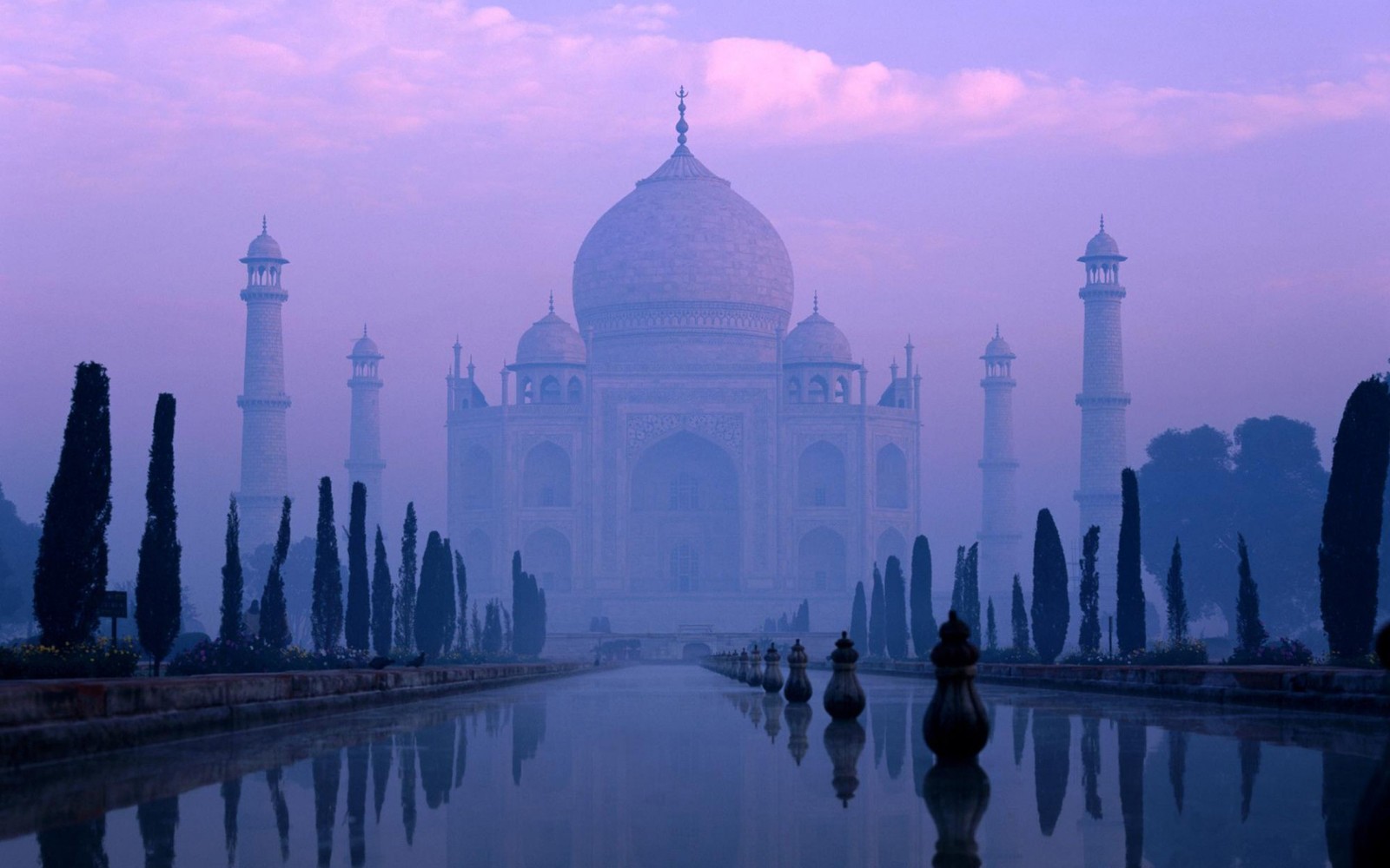 Arafed view of a large building with a reflection in the water (taj mahal, landmark, morning, tourist attraction, cityscape)