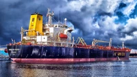 Cargo Ship at Port Under Dramatic Skies