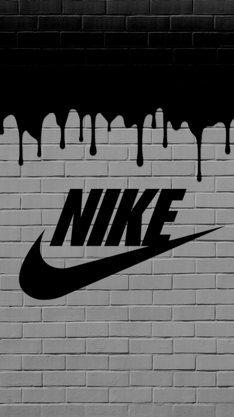 Черно-белая фотография логотипа nike на кирпичной стене (чёрный, бренд, кирпич, граффити, логотип)