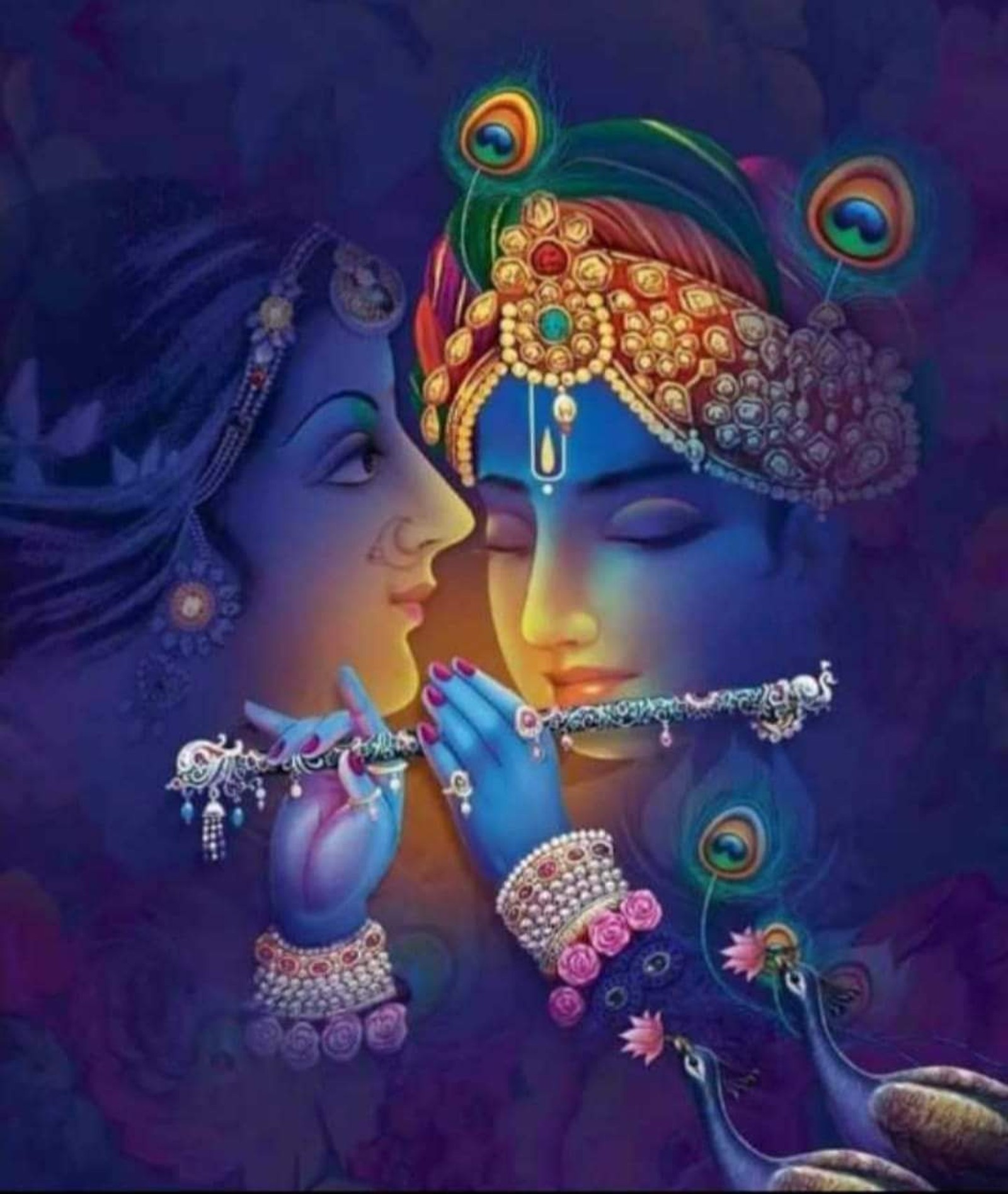 A painting of two women with their faces painted in blue and gold (krishna, radha, radha krishna)