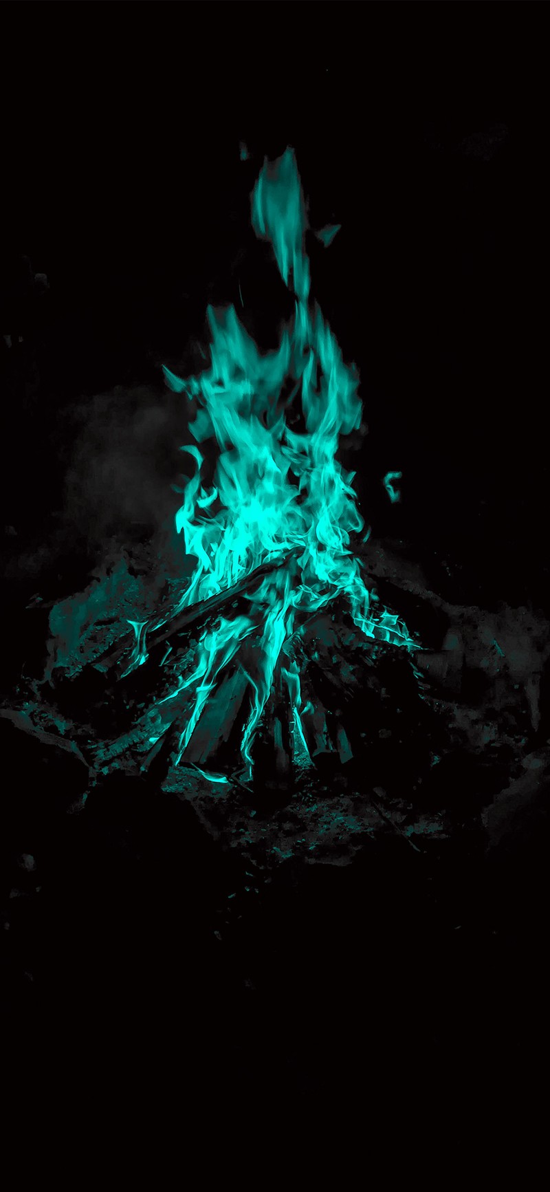 Araffe in the dark with green flames on the ground (fire, campfire, blue)