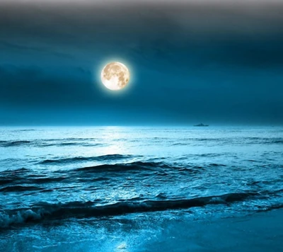 Illuminated Moon Over Tranquil Ocean Waves