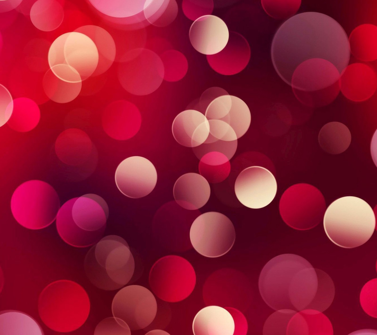 A close up of a red and white bokeh background with circles (bubles, red)