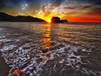 Vibrant Sunset Over Serene Seaside Waves