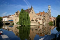 Tranquil Reflections of Bruges: A Picturesque Canal Scene