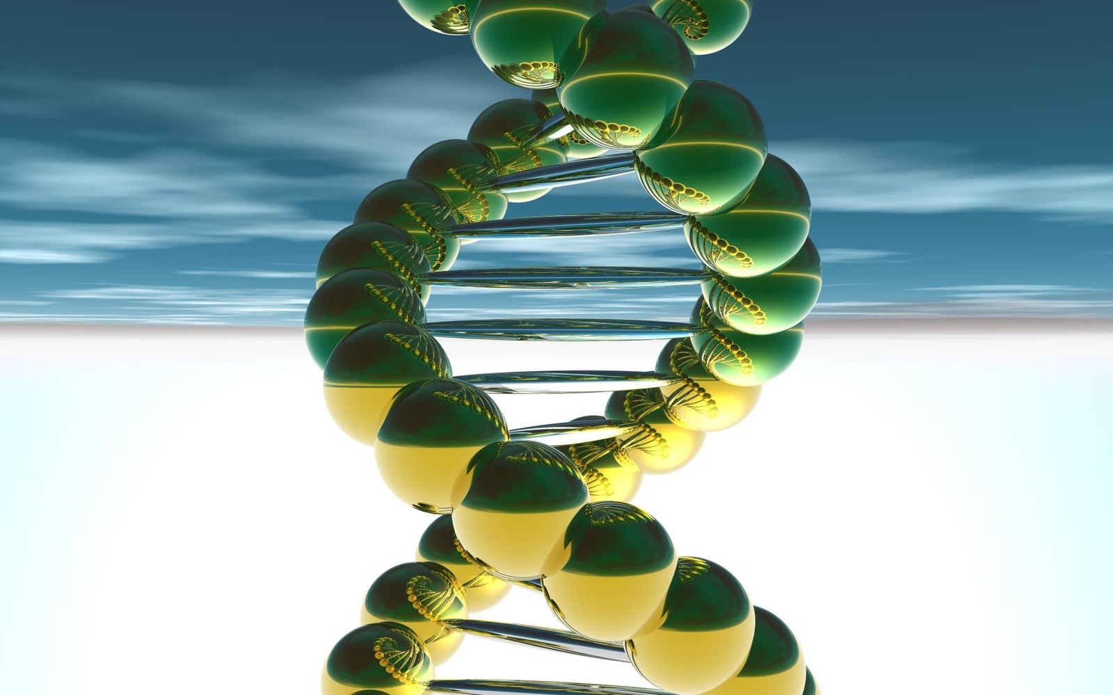 A close up of a green and yellow dna model on a white surface (sphere, shape, line, cell, circle)