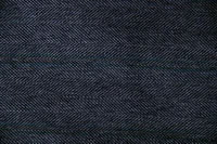 Tissu en laine tissé avec un motif en chevrons bleu et noir