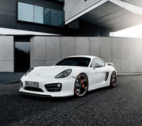 Sleek White Porsche Cayman: A Racing Icon in Urban Setting