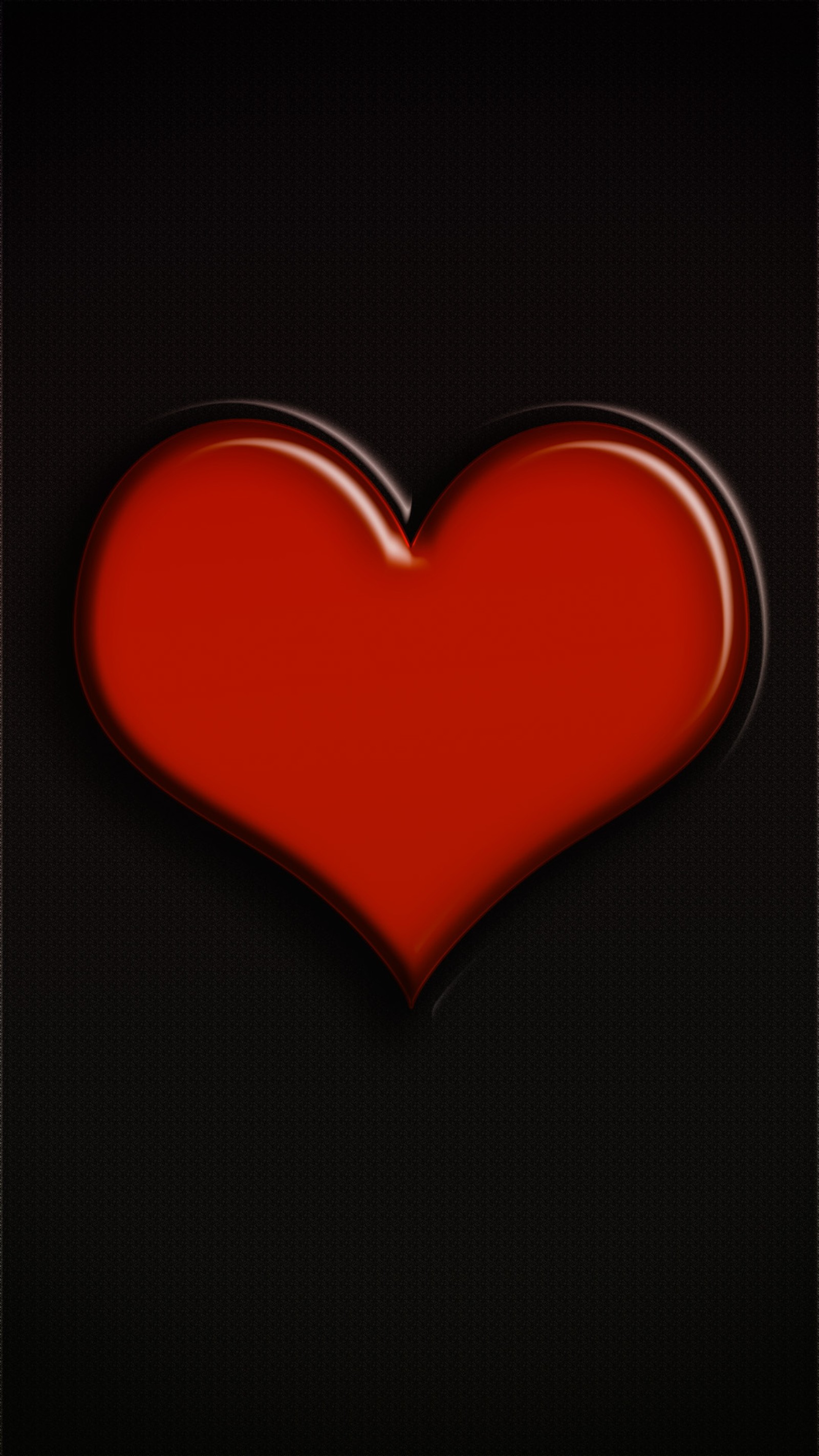 A close up of a red heart on a black background (forever, heart, hearts, love)