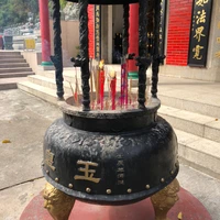 Incense Burner at Sacred Stairs with Nearby Bench