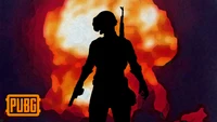 Silhouette de un personaje de PUBG contra un fondo de explosión vibrante.