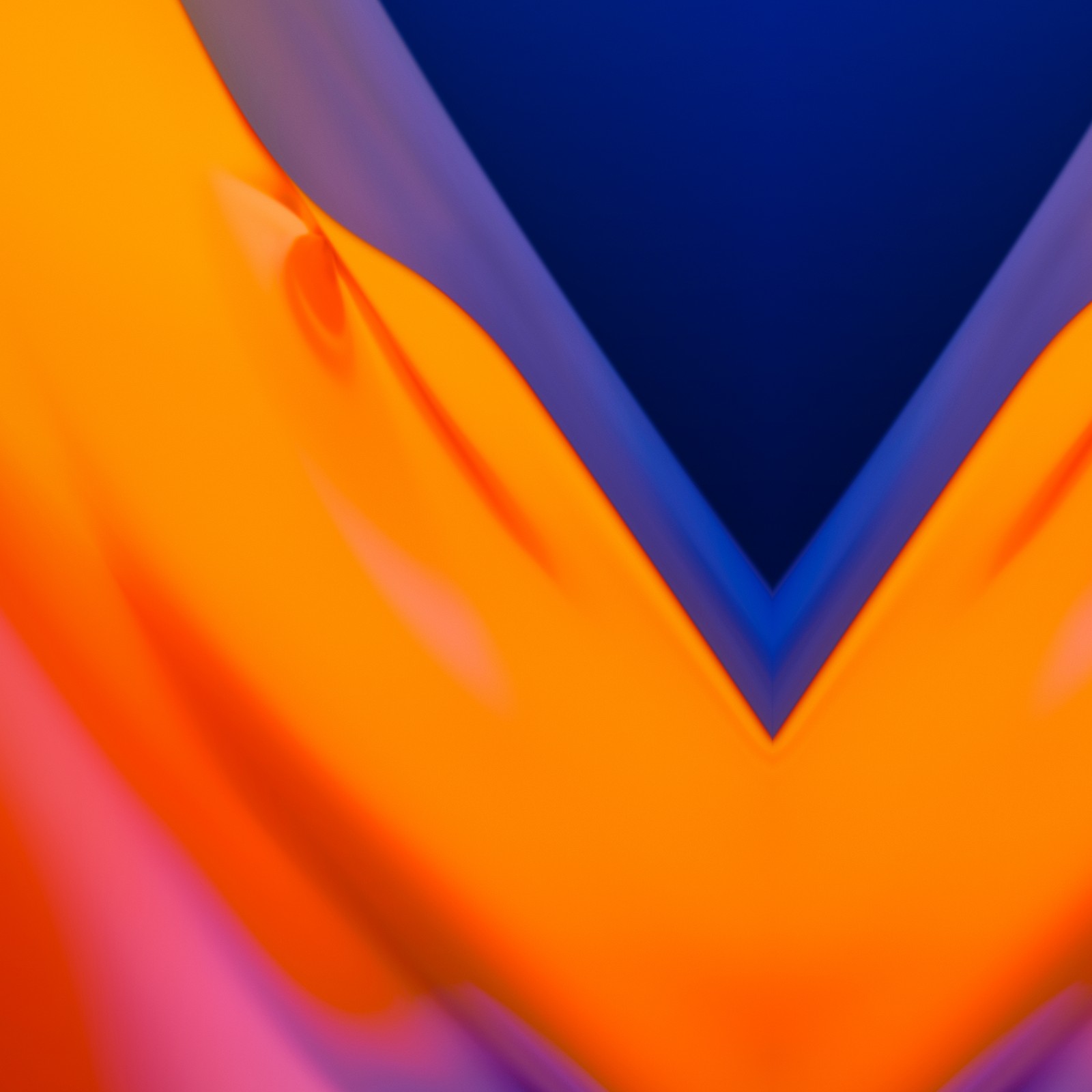 Acercamiento de una fotografía abstracta colorida de una persona (naranja, capucha, ámbar, gesto, azul eléctrico)