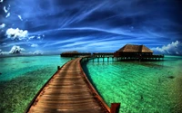 Scenic Azure Waters with Elevated Walkway and Lush Cloudscape