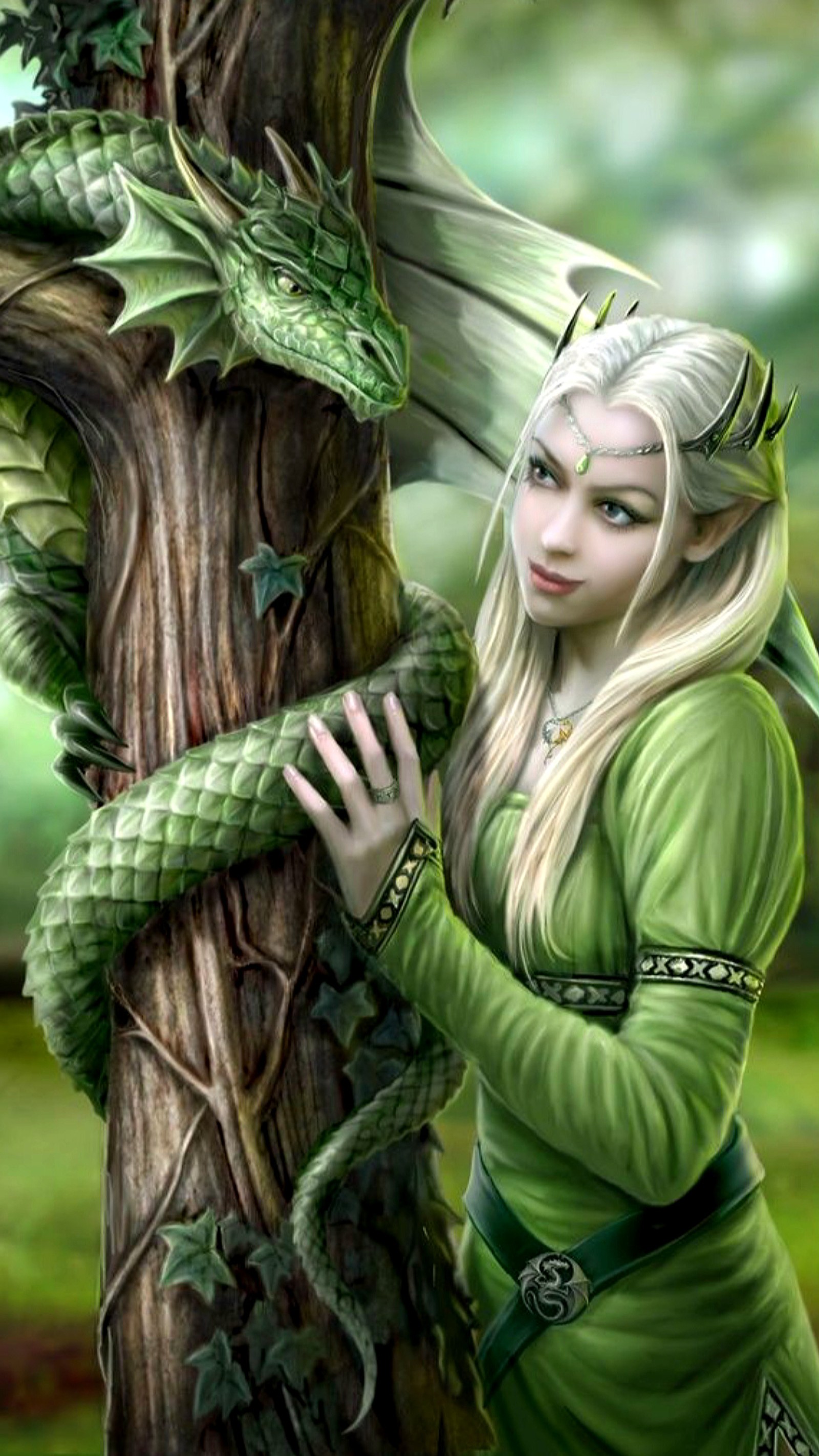 A woman in green dress standing next to a tree with a dragon on it (dragon, fantasy, girl, green, tree)