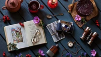 Cozy Table Setting with Vintage Camera, Book, and Sweet Treats