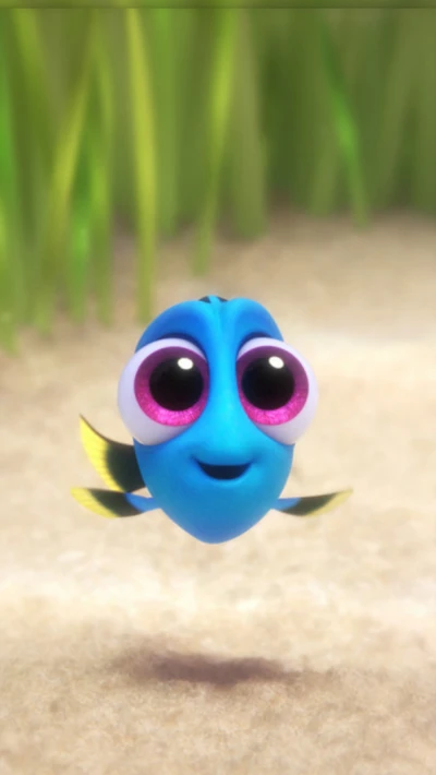 Joli poisson bébé de dessin animé avec de grands yeux et un sourire joyeux