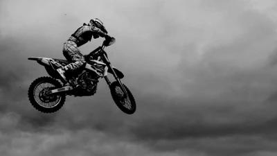 Freestyle Motocross Performer in Mid-Air Stunt