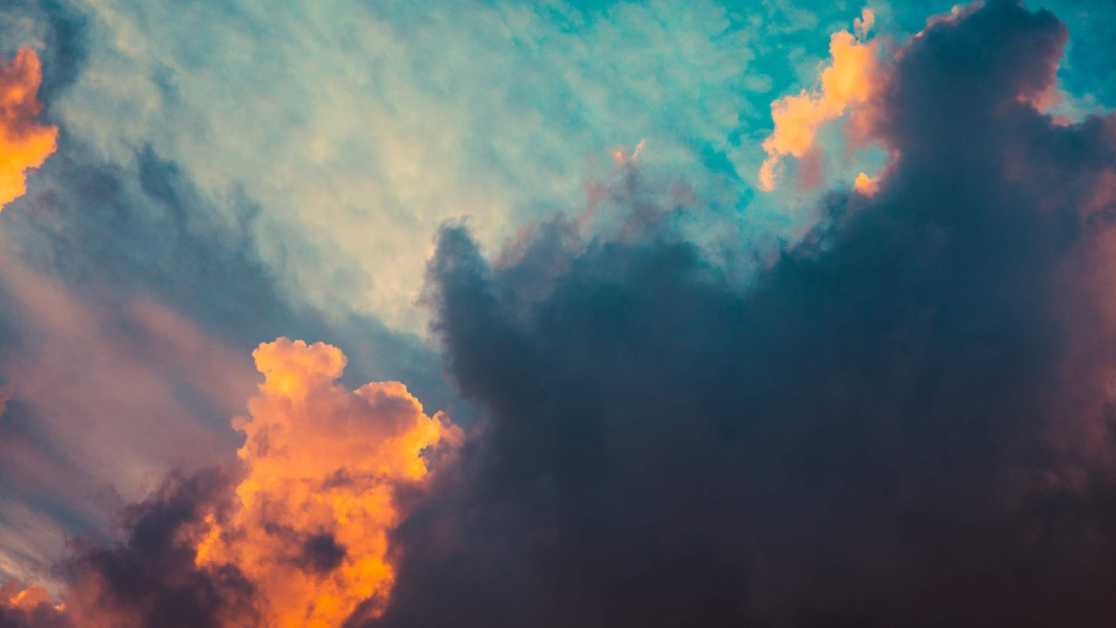 A close up of a plane flying through a cloudy sky (lineageos, android, nature, blue, daytime)