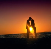 Romantic Silhouette Against a Sunset Horizon