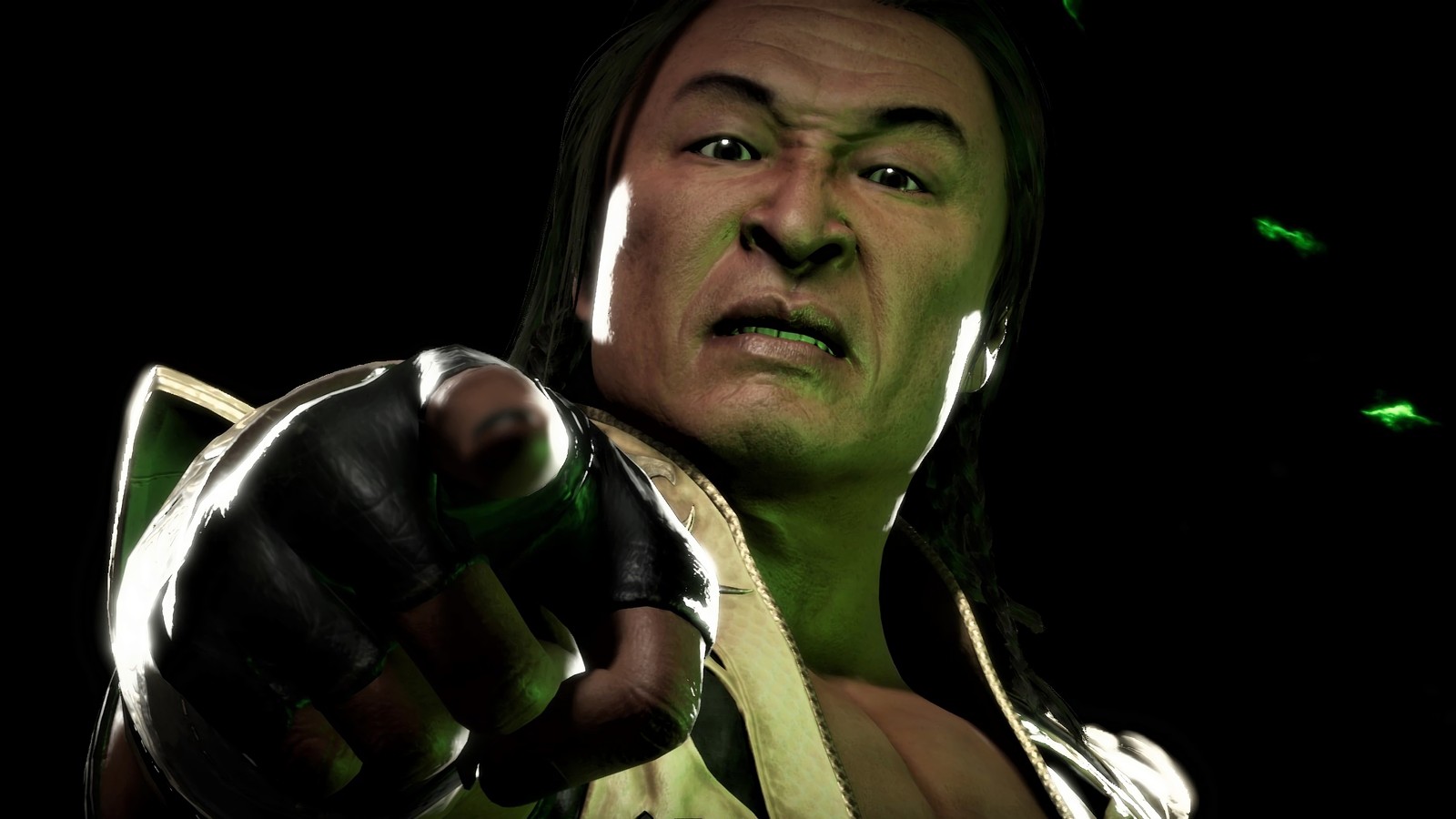 Un primer plano de un hombre apuntando con una pistola a algo (shang tsung, mortal kombat 11, videojuego)