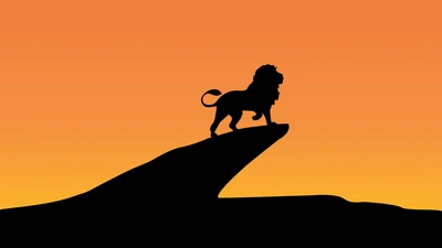 Silhouette d'un lion au sommet d'un rocher contre un arrière-plan de coucher de soleil vibrant.