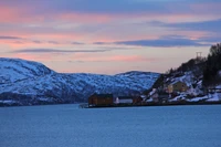 Twilight Over Snowy Fjord: Highland Reflections at Dusk