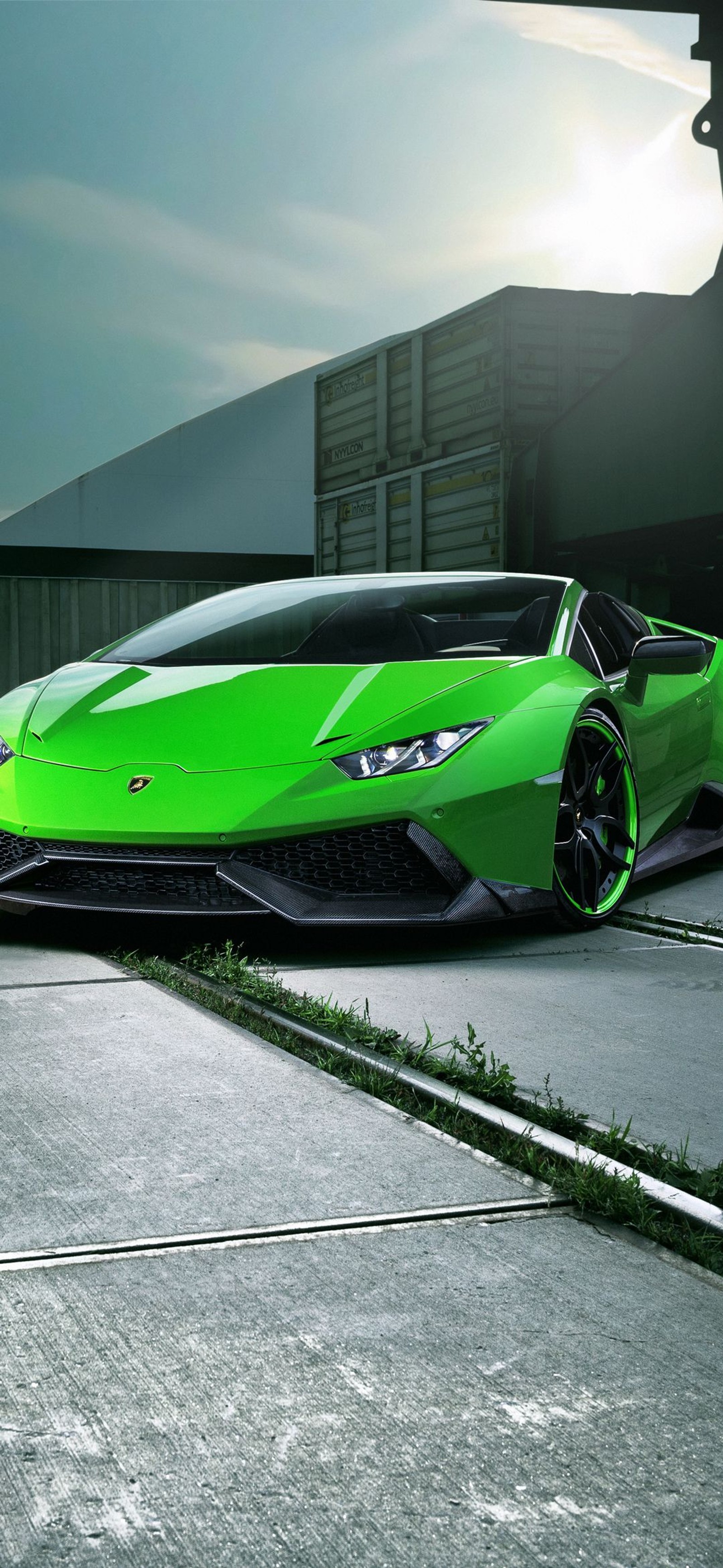 A close up of a green sports car parked on a street (lamborghini gallardo, lamborghini, lamborghini huracan, cars, sports car)