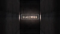 Neon 'Success' Sign on Dark Wall