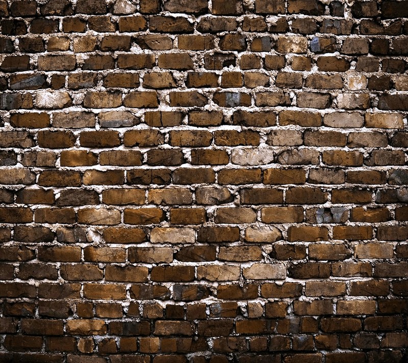 Крупный план кирпичной стены с пожарным гидрантом посередине (bricks background, natural wall)