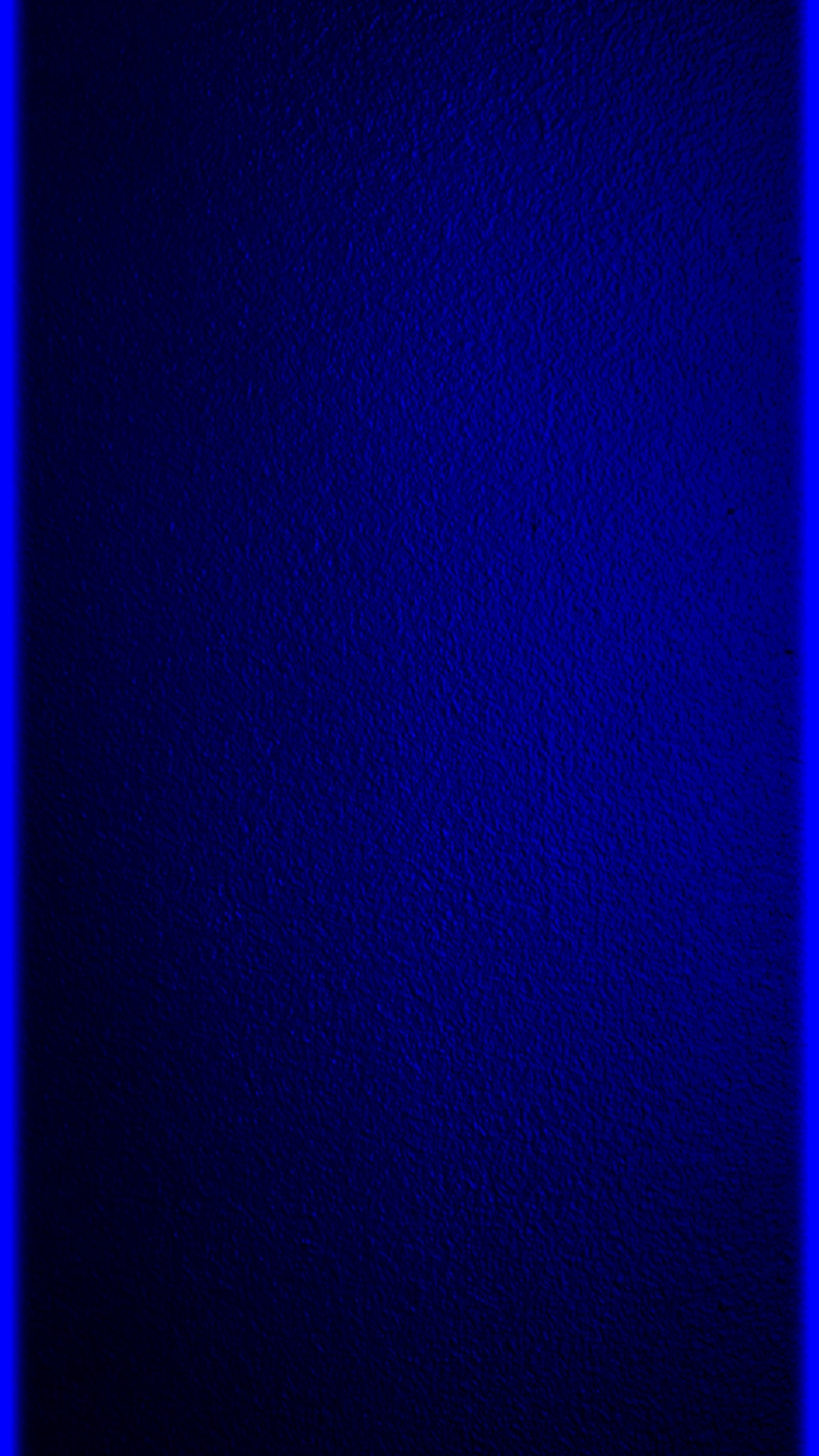 A close up of a blue neon frame on a black background (blue, edge, s7, texture)