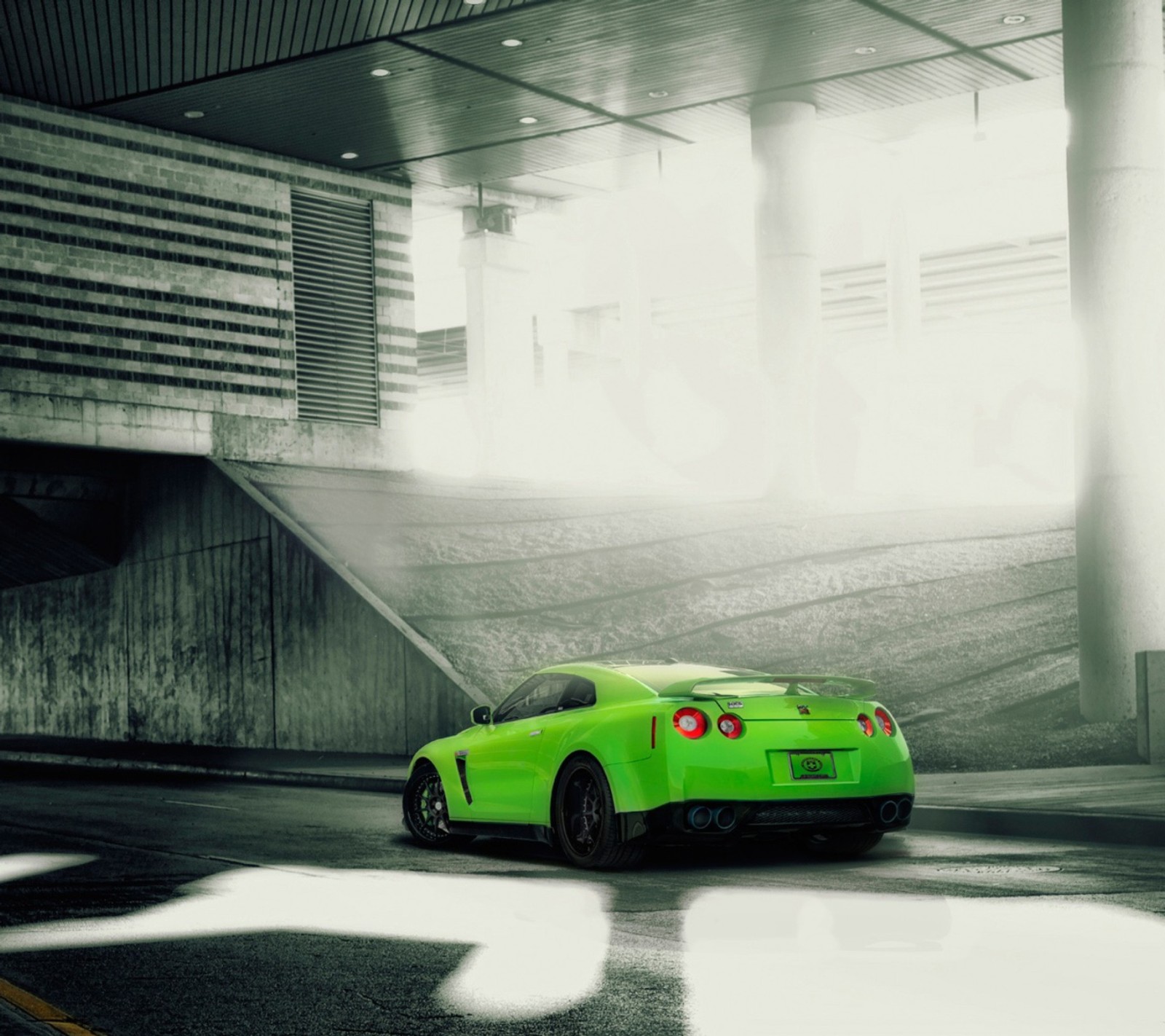 Arafed green sports car parked in a parking garage (car, forza, godzila, green, gtr)