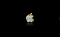 Golden Apple Logo Shimmering in Darkness