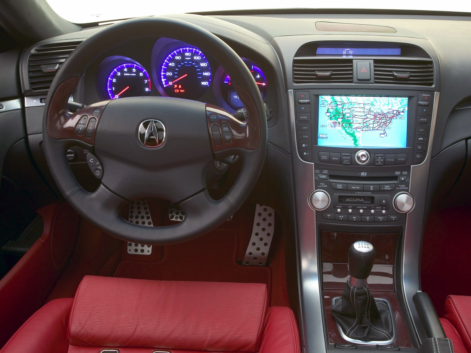 A close up of a car dashboard with a steering wheel and a dash board (acura, steering wheel, center console, motor vehicle, sedan)