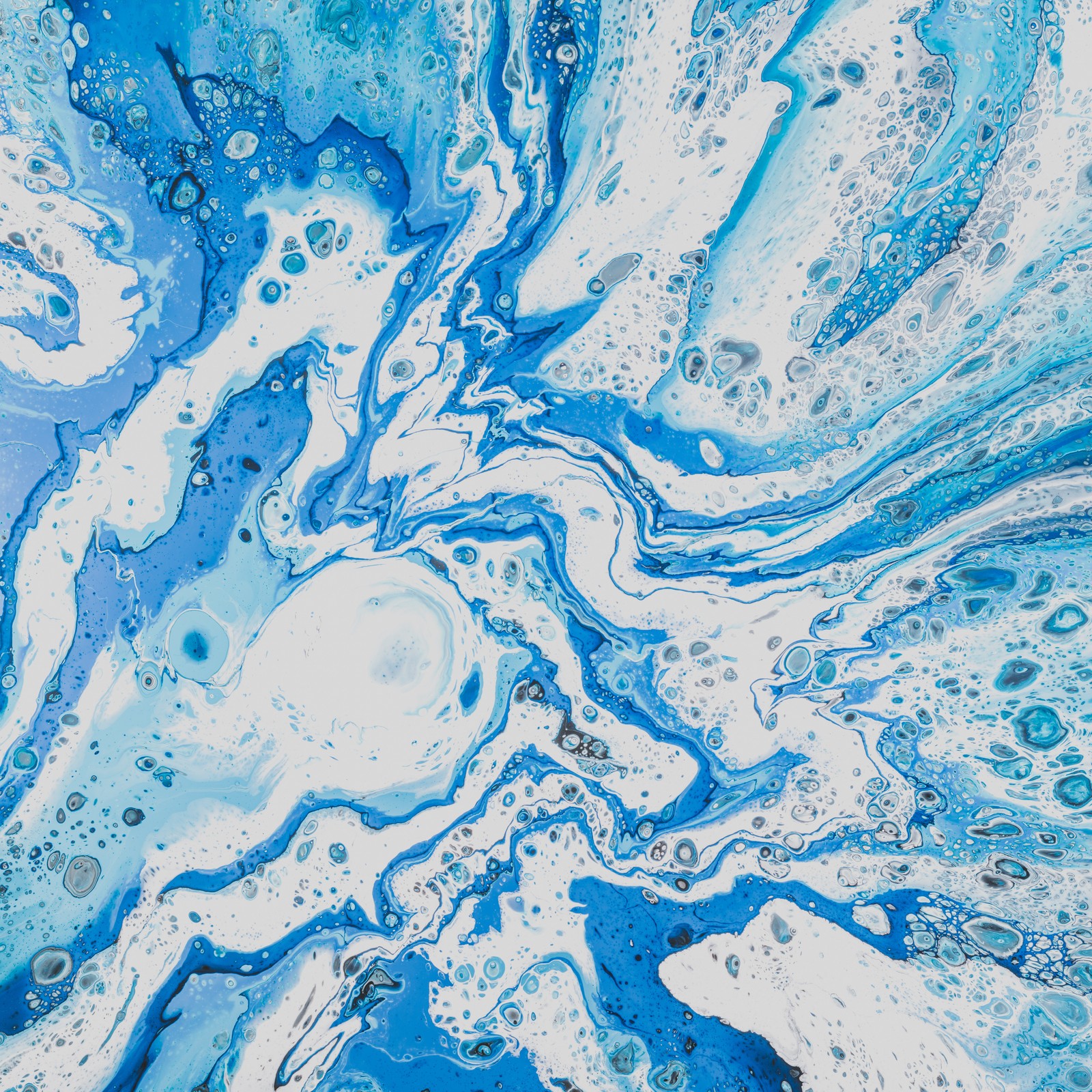 A close up of a painting of blue and white paint (azure, blue, aqua, pattern, water)