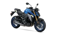 Suzuki GSX S1000 em um fundo branco - uma impressionante moto esportiva em azul vibrante e prata.