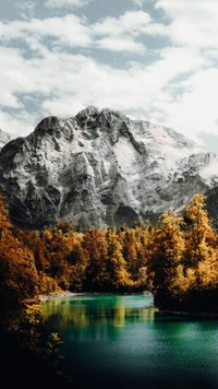 Autumn Serenity: Majestic Mountains Reflecting in a Tranquil Lake