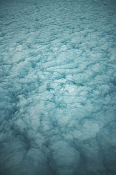 Turquoise Sea Under a Cloudy Sky