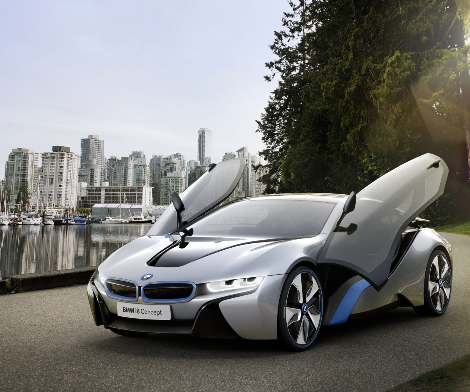 Bmw i8 concept car on the road with city in background (bmw, cars, concept)