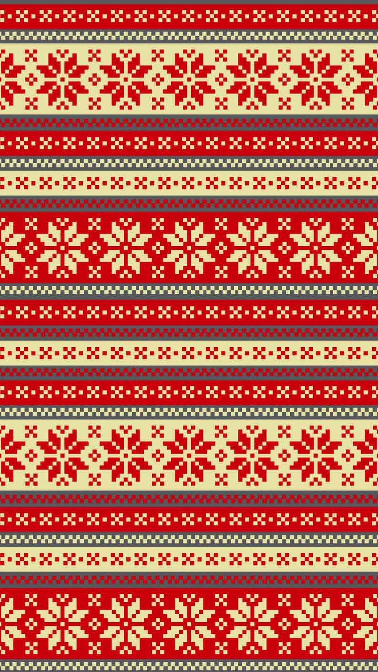 A red and beige christmas sweater with snowflakes on it (christmas, sweater)