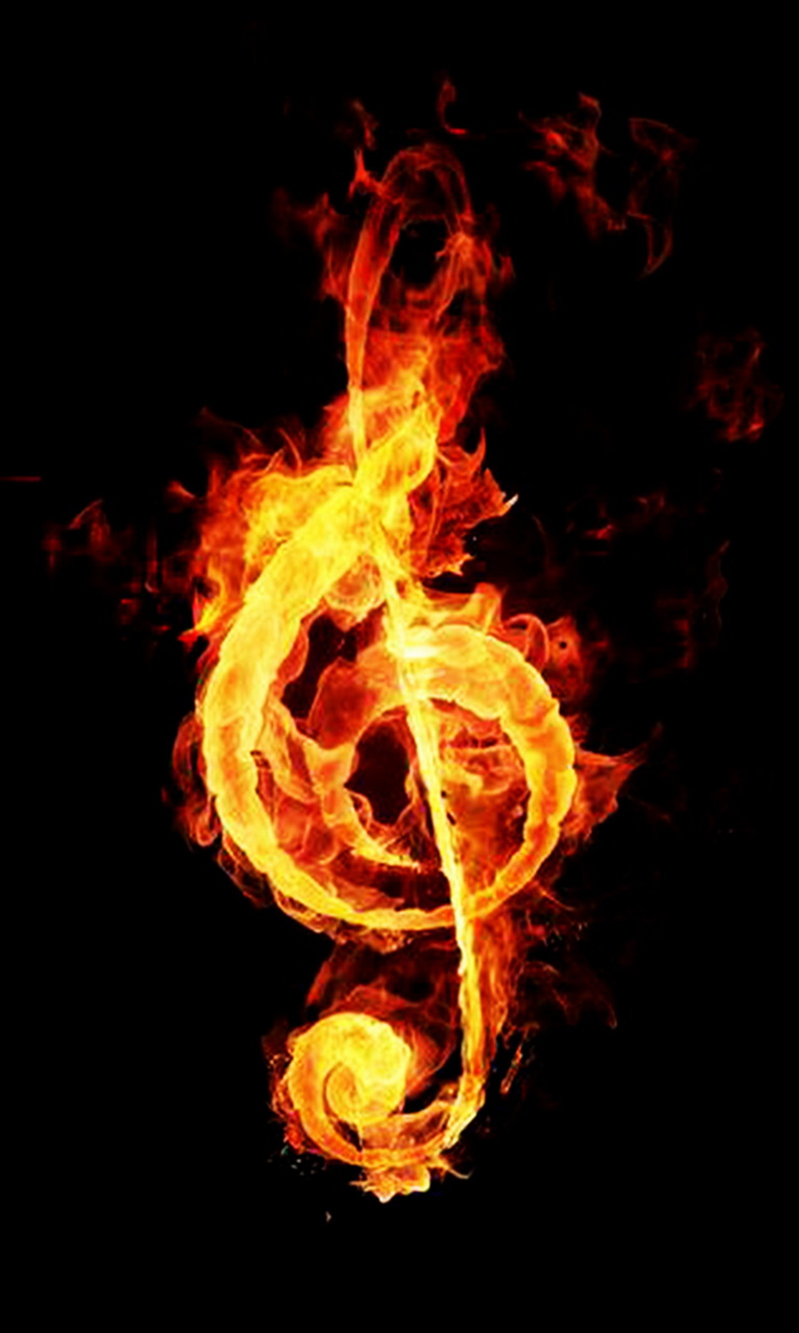 A close up of a fire treble on a black background (fire, flame, music, symbol)