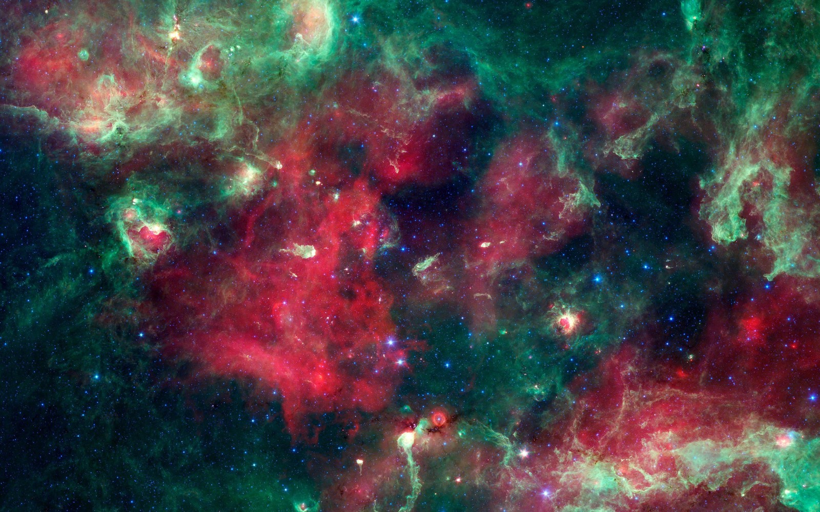 Primer plano de una nebulosa muy colorida con muchas estrellas (nebulosa, objeto astronómico, verde, espacio exterior, galaxia)