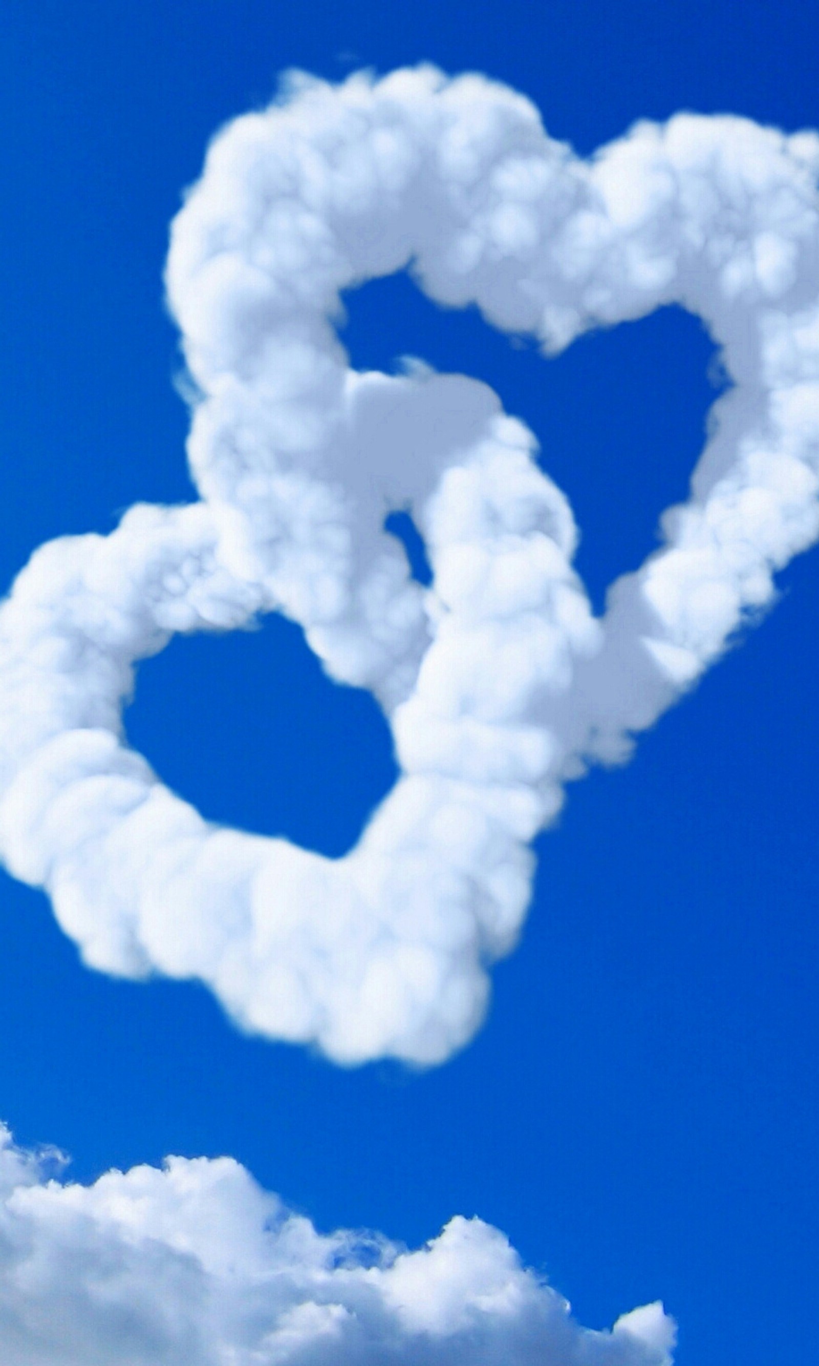 There are two heart shaped clouds in the shape of a heart (druffix, heart, love, samsung galaxy s8, sky)