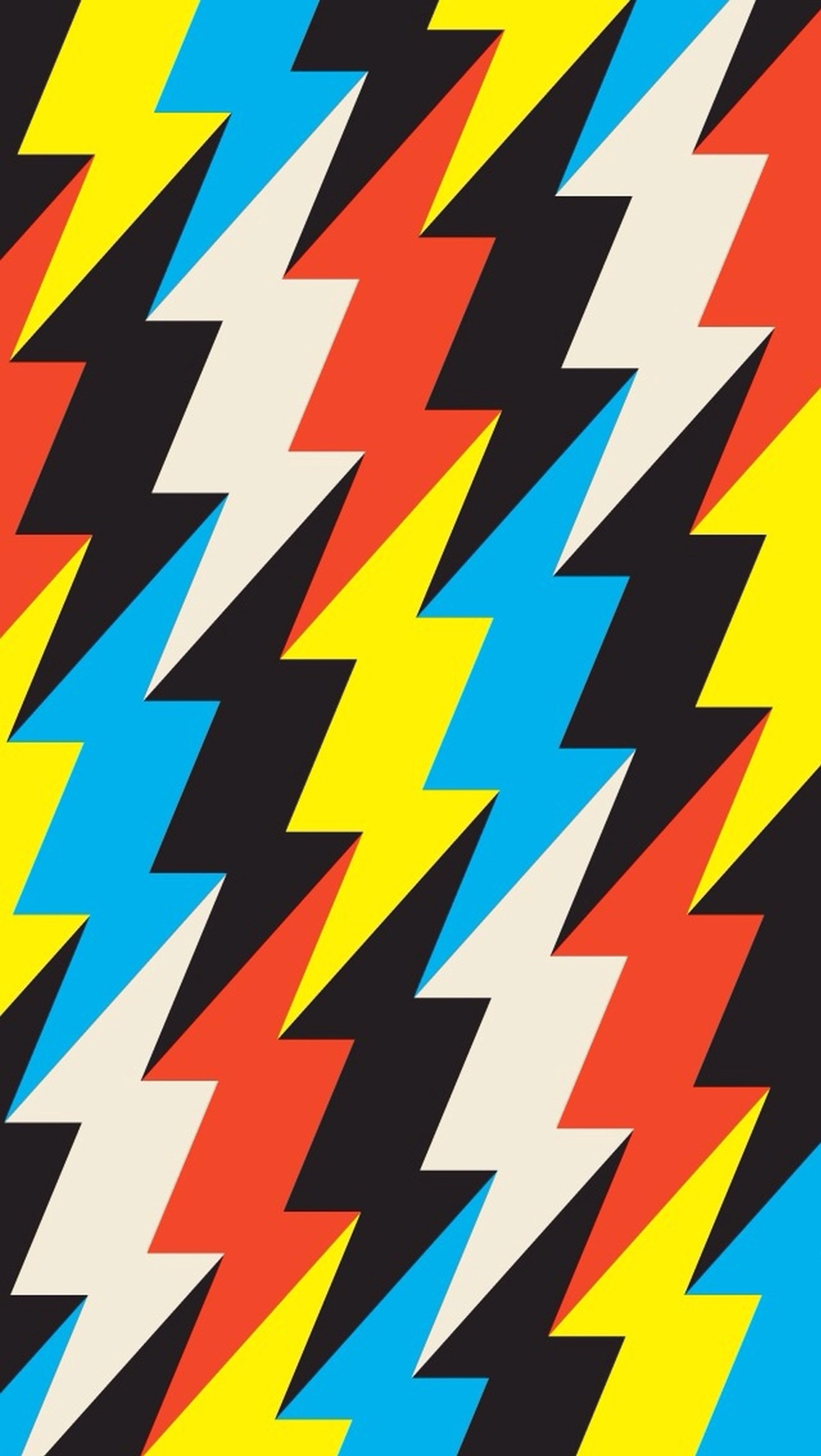 A close up of a colorful pattern with lightnings on it (pattern, zig zag)