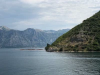 Scenic Coastal View with Mountainous Backdrop