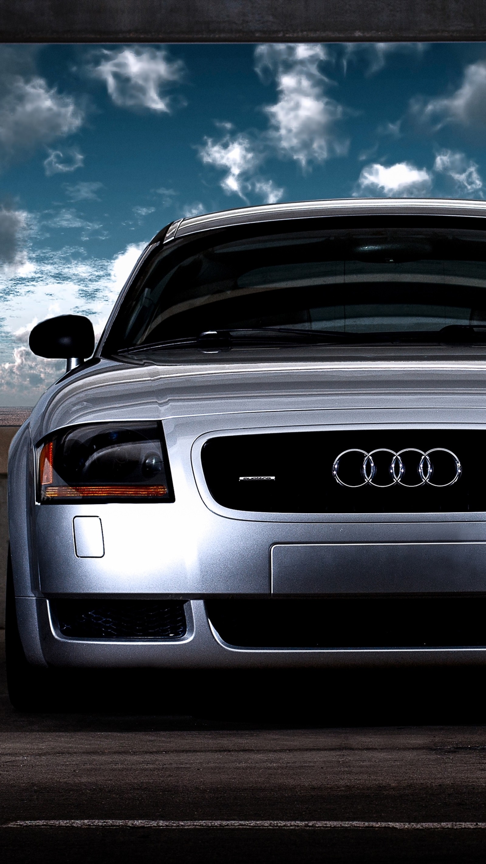 Audi car parked in parking lot with cloudy sky in background (audi, auto, car, quattro, tt)