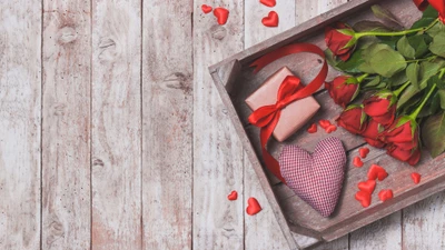 Plateau-cadeau romantique avec des roses, des cœurs et une surprise pour la Saint-Valentin