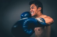 Intense Punch: A Boxer Delivering a Powerful Hook in the Ring