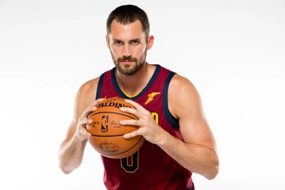 Cleveland Cavaliers Player Holding Basketball in Team Jersey