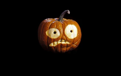 Whimsical Halloween Lantern: Carved Pumpkin with Expressive Face