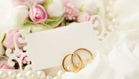 Elegant Wedding Anniversary Celebration with Floral Accents and Gold Rings